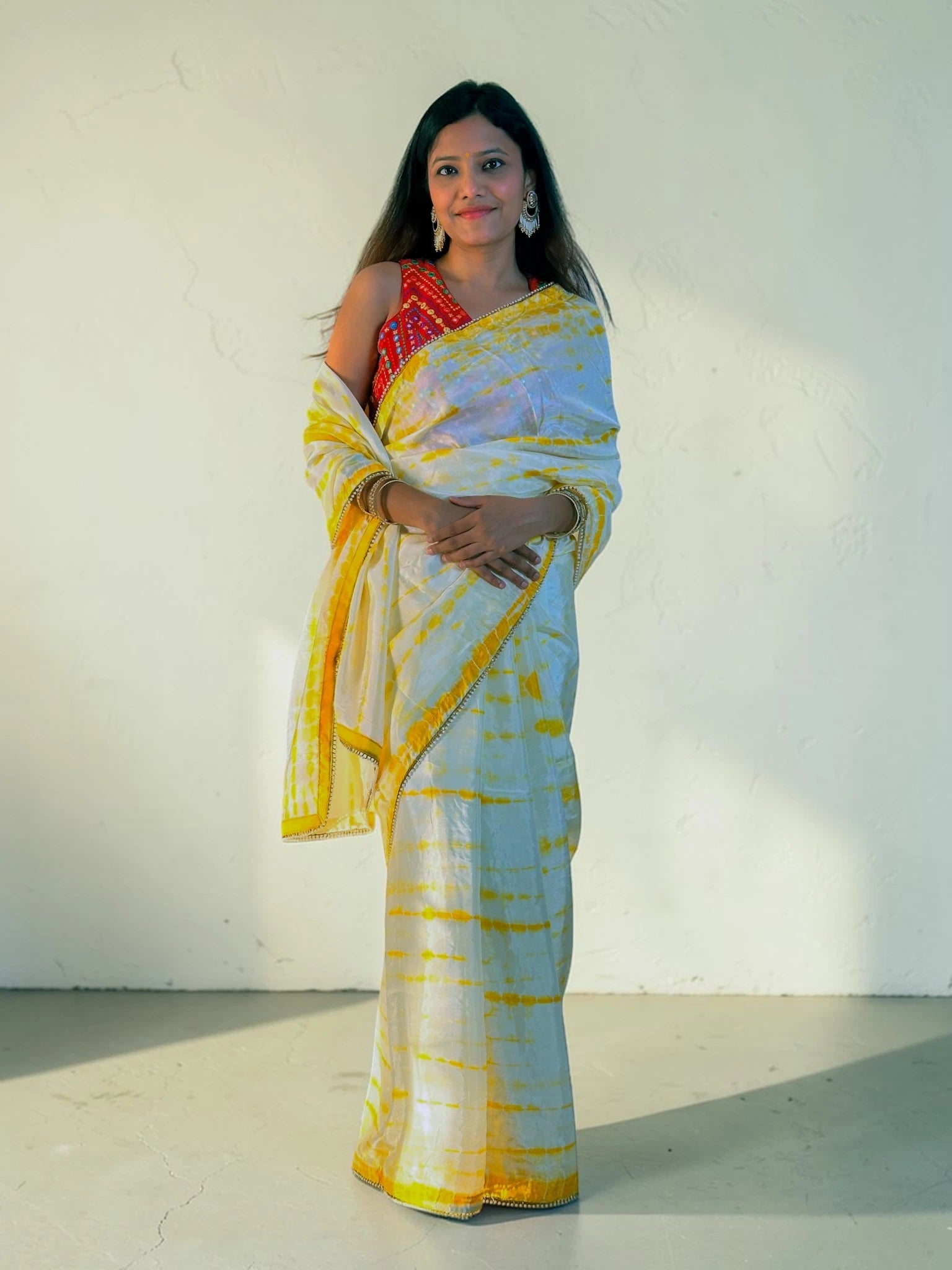 Yellow tie and die Saree