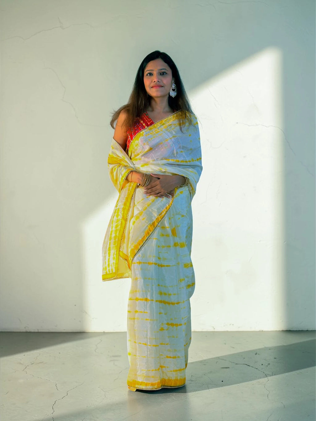 Yellow tie and die Saree