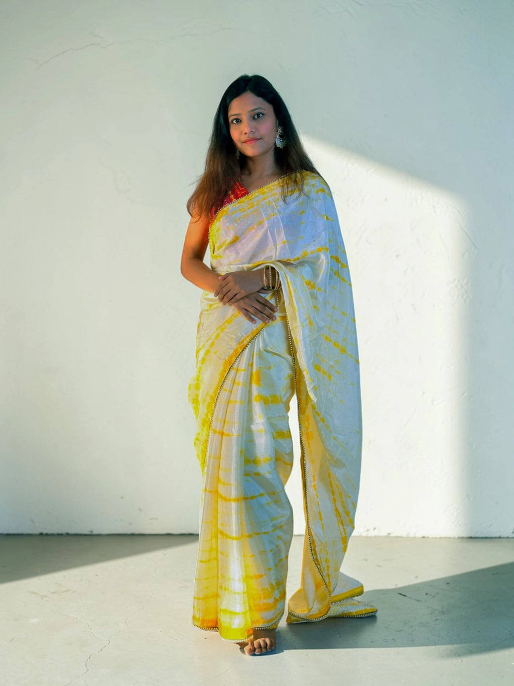 Yellow tie and die Saree