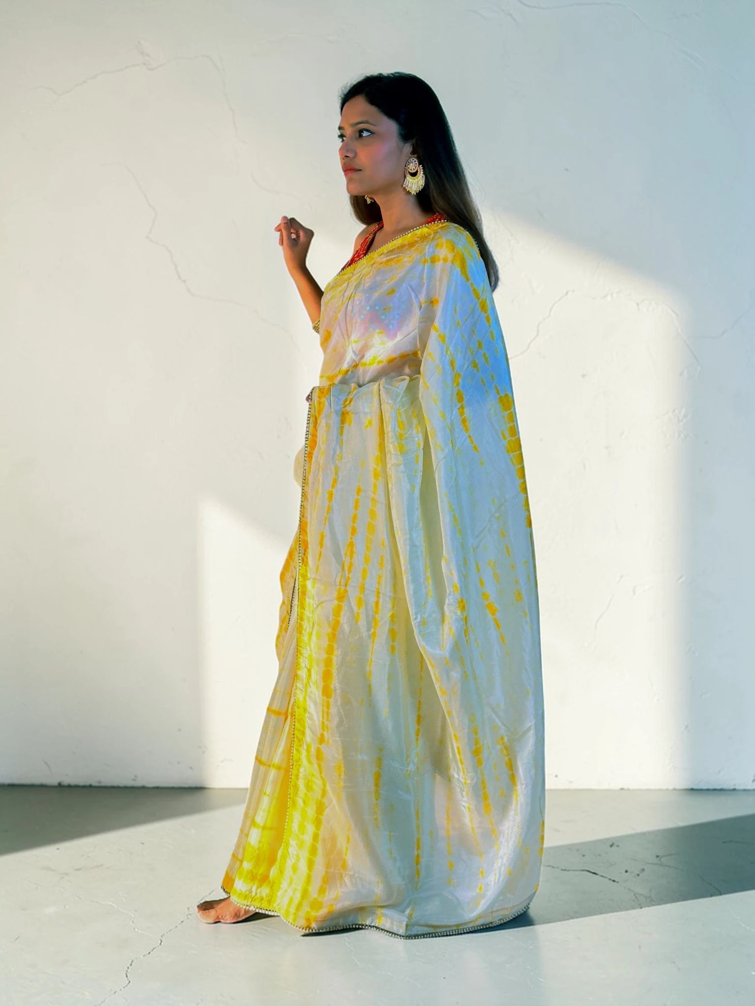 Yellow tie and die Saree