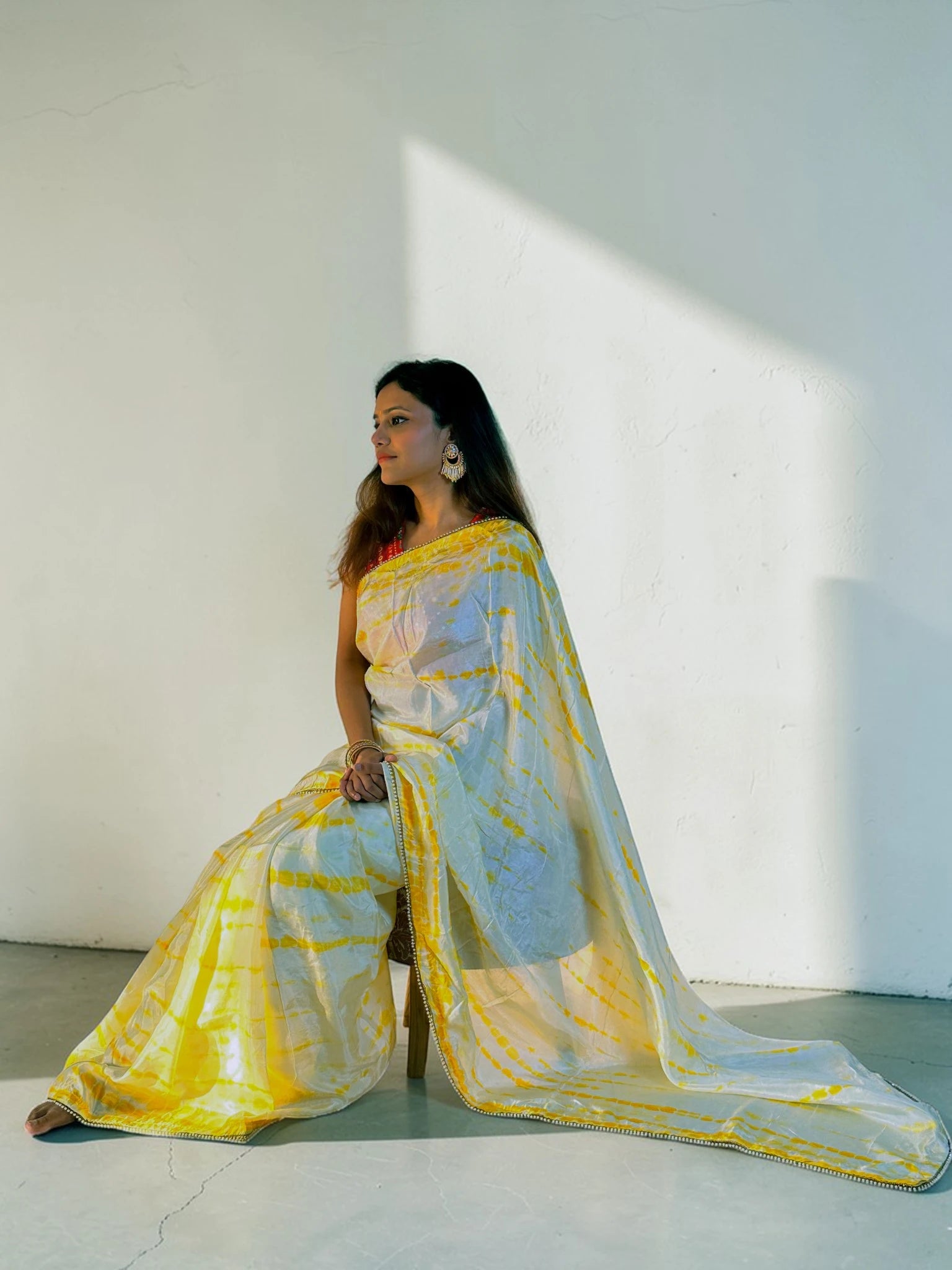 Yellow tie and die Saree